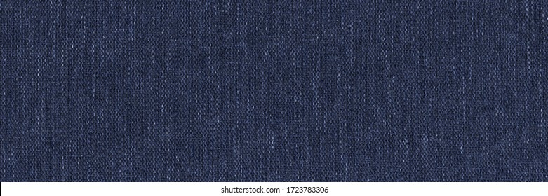 Dark blue denim background, detailed and high resolution fabric texture. Wide and long textile banner.