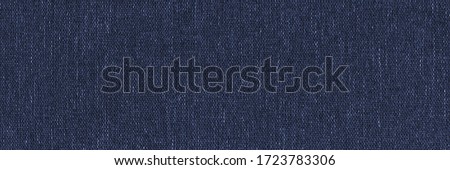 Dark blue denim background, detailed and high resolution fabric texture. Wide and long textile banner.