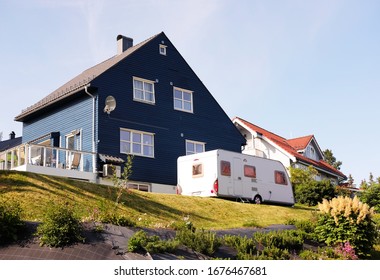 Dark Blue Family House With A Camper For Travel, The Theme Of Buildings And Backgrounds
