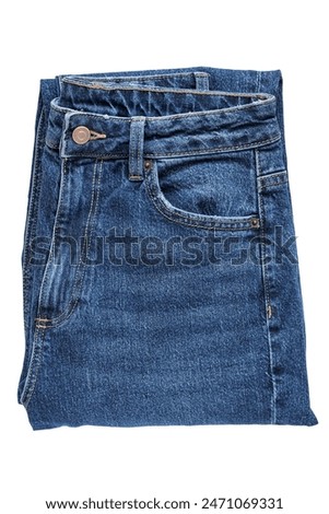 Dark blue folded jeans isolated on white background