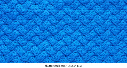 Dark Blue Knitted Texture. Abstract Background, Pattern. Detail Of A Warm Winter Sweater.