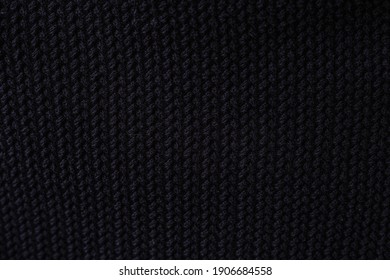 Dark blue knitted texture background