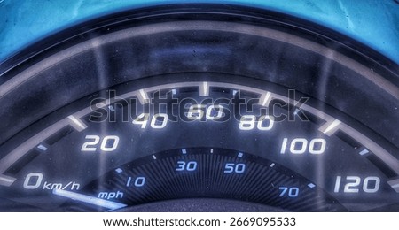 The dark blue lighting and sharp focus create a detailed, technical aesthetic, perfect for automotive and motorcycle content.