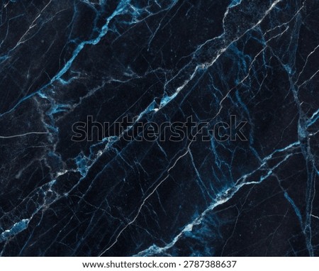 Dark blue marble texture background with white veins