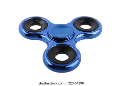 dark blue metal spinner isolated on white background. popular fashionable trendy game toy of 2017
