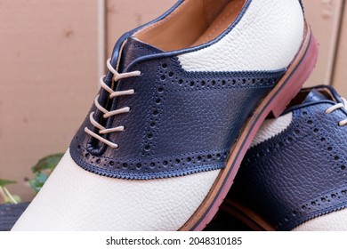 Dark Blue Navy And Ivory Colored Classic Oxford Saddle Shoes.