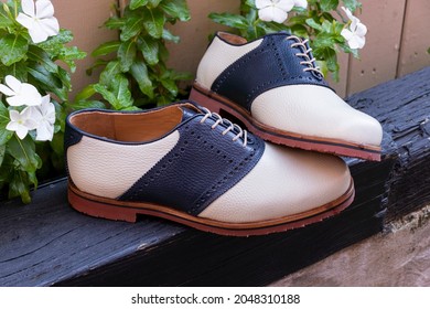 Dark Blue Navy And Ivory Colored Classic Oxford Saddle Shoes.