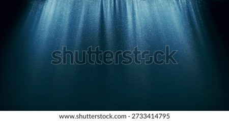 Dark Blue Ocean Surface Seen from Underwater. Abstract Waves and Rays of Sunlight Shining Through