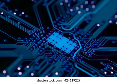 Dark Blue Pcb Board Integrated Circuit With Microchip Background