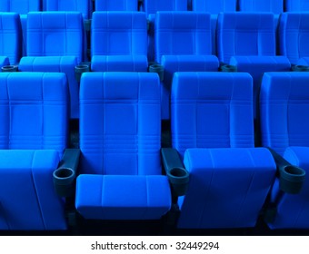 Dark blue rows of theater seats