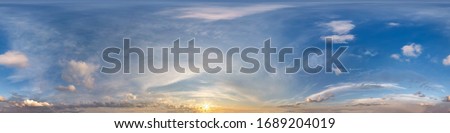 dark blue sky before sunset with beautiful awesome clouds. Seamless hdri panorama 360 degrees angle view with zenith for use in graphics or game development as sky dome or edit drone shot