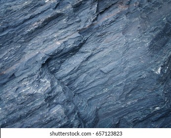  Dark blue slate background or texture.                                 