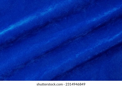 Dark blue velvet fabric texture used as background. blue fabric background of soft and smooth textile material. There is space for text.	 - Shutterstock ID 2314946849