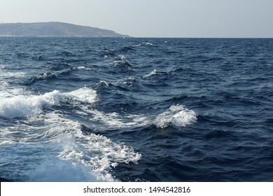 Dark Blue Wavy Sea With White Foam Background