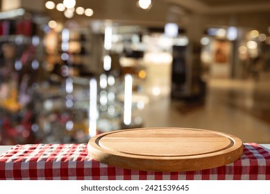 dark blurred background with empty table top, cafe restaurant windows. background for your product. High quality photo