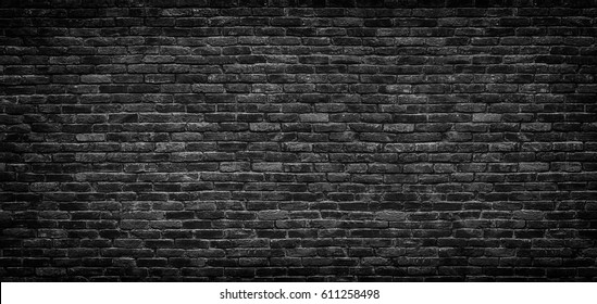 Dark brick wall, texture of a black brick background