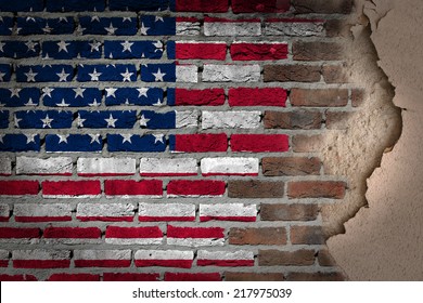 Dark brick wall texture with plaster - flag painted on wall - USA