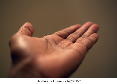 Dark Brown Asian One Empty Human Hand Palm Creases Showing Direction Or Reading Begger.