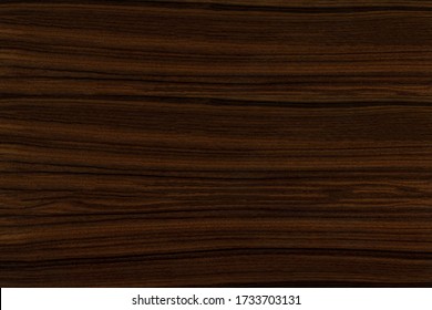 Dark brown bookmatched walnut wood texture