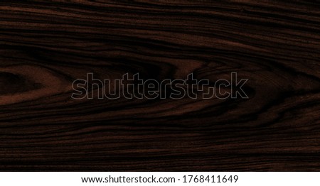 Dark brown crown cut wavy walnut wood texture