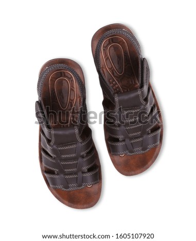 dark brown leather sandals isolated on white background