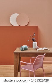 Dark Brown And Pink Wall Background Room And Frame, Metal Chair Green Style And Vase Of Cactus. Dinning Room Wooden Table.