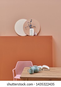 Dark Brown And Pink Wall Background Room And Frame, Metal Chair Green Style And Vase Of Cactus. Dinning Room Wooden Table.