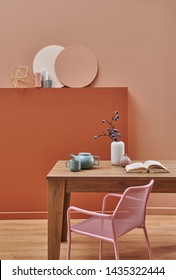 Dark Brown And Pink Wall Background Room And Frame, Metal Chair Green Style And Vase Of Cactus. Dinning Room Wooden Table.