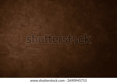 Dark brown plaster wall with deep vintage texture and rustic tone