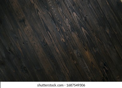 Dark Brown Rustic Cedar Wood Background Texture. Diagonal Wooden Boards Farm Style Background.