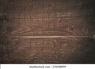 Dark Brown Scratched Wooden Cutting Board. Wood Texture