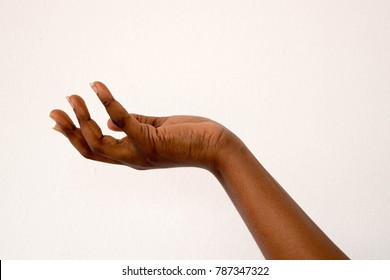 Dark Brown Skin African Female Gesture Hand Isolated On A White Background.