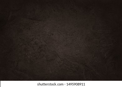 Dark brown slate rock texture with high resolution, background of natural stone wall.
