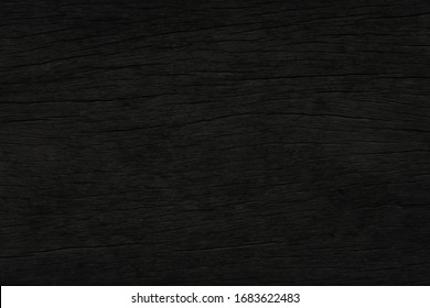 Dark Brown Wood With A Rough Surface  For Texture And Background