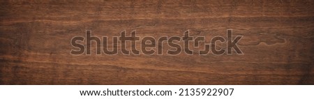 dark brown wood texture, old walnut boards. wooden panel background