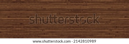 Dark brown wooden surface wide panoramic texture. Natural bamboo wallpaper. Wood slat wall large background