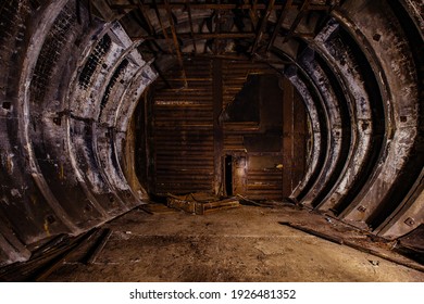 Dark burnt abandoned Soviet bunker after fire.