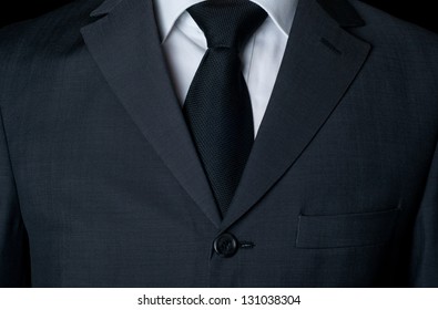 Dark Business Suit With A Tie