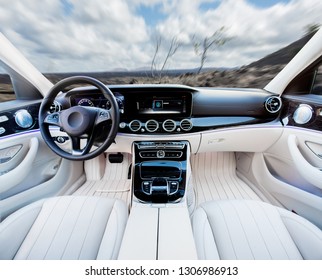 Dark Car Interior - Steering Wheel, Shift Lever And Dashboard. Car Modern Inside. Front View On Sunset And Sea Background. The Sun Shines In The Glass.glare