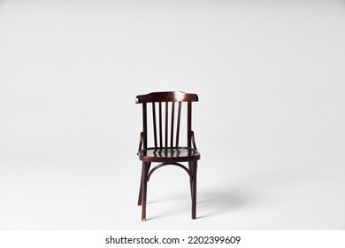 Dark Chair On Cyclorama Under Flash Light