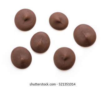 Dark chocolate chips isolated on white background. Top view. - Shutterstock ID 521351014