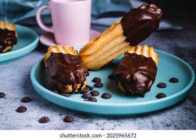 Dark Chocolate Coated Half Digestive Biscuit With Chocolate Cookies And Chips For Loved Ones Valentines Day Celebration. Partially Eaten With Crumbs. Side View.