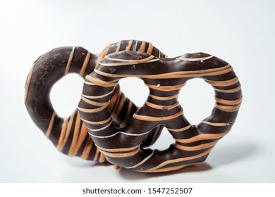 Dark Chocolate Pretzels Isolated On White