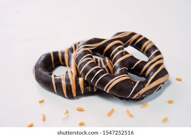 Dark Chocolate Pretzels Isolated On White