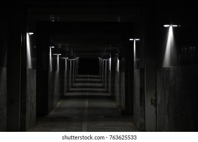 Dark city tunnel connecting the nature and the city