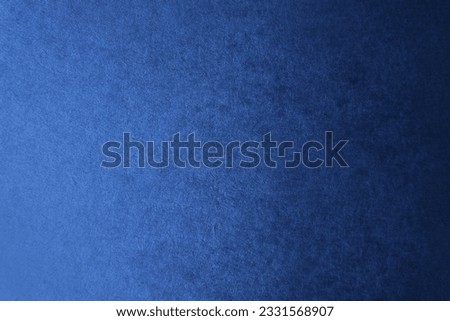 Dark classic deep navy blue color gradation with light tone paint on environmental friendly blank cardboard box paper texture background with space minimal design