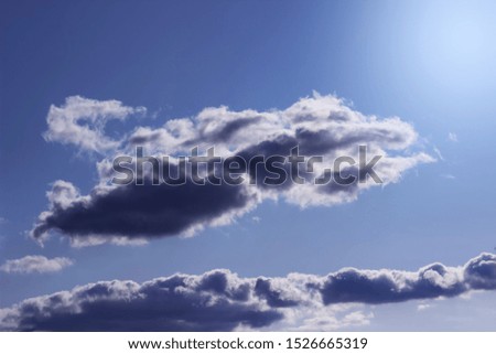 dark cloud in clear sky