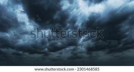 Dark clouds before a thunder-storm.