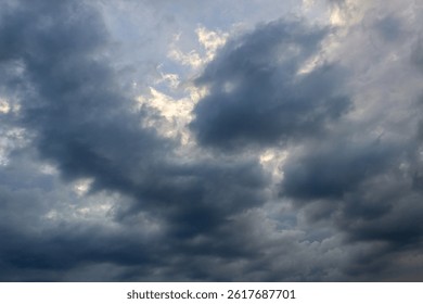 Dark clouds before a thunder-storm. Dramatic sky. Abstract background.