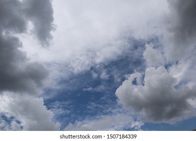 Dark clouds begin to appear in the sky during the rainy season in Thailand, which is in Asia. - Shutterstock ID 1507184339